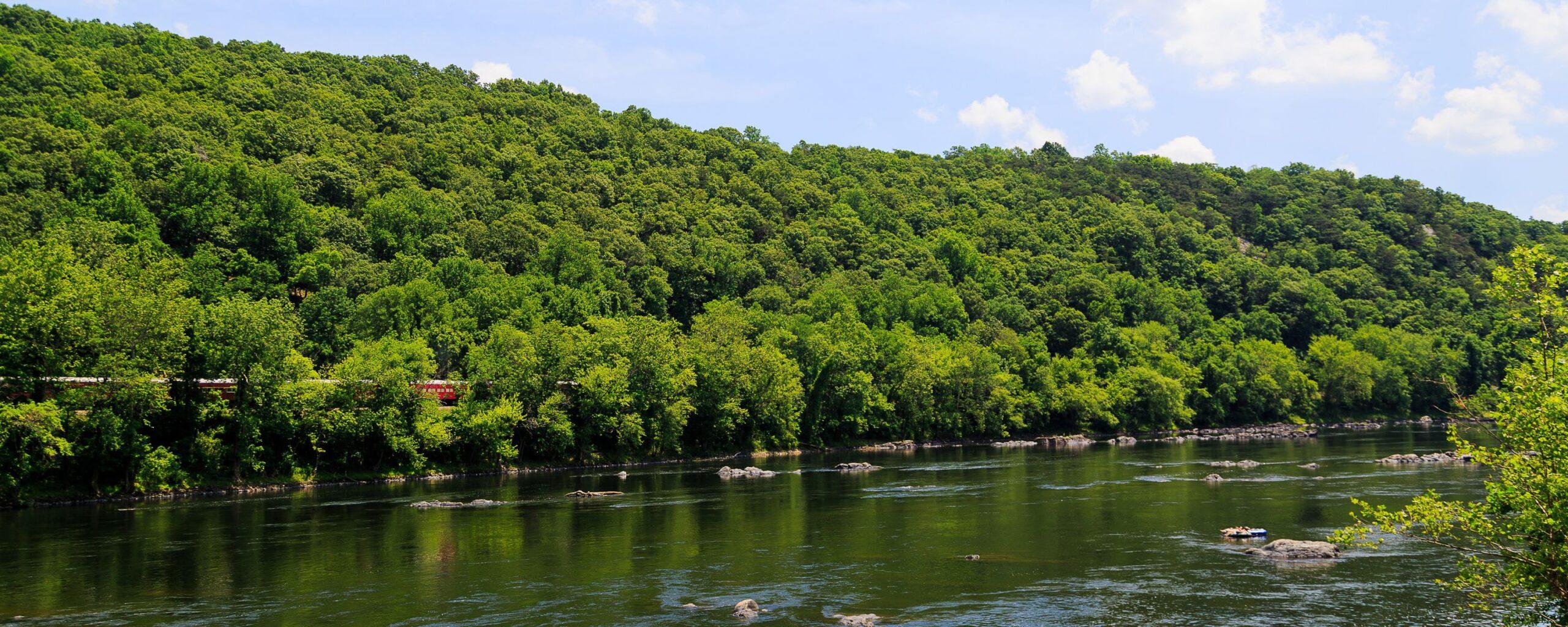 The Delaware River during the day with few clouds in the air