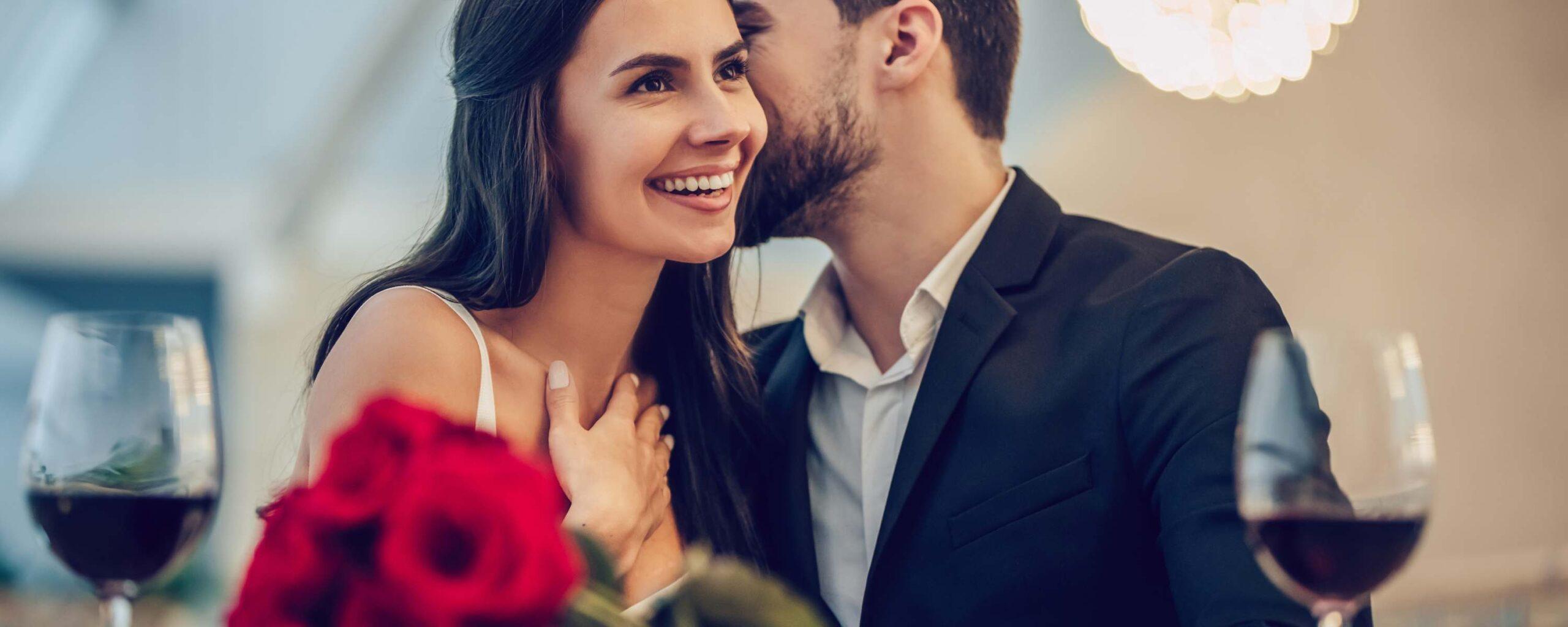 A couple talking in a romantic restaurant