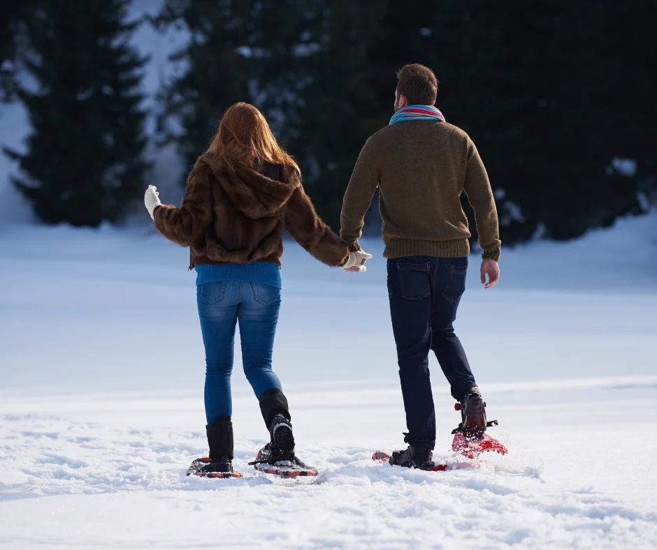 couple snowshoeing