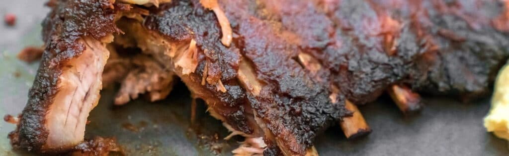 a slab of meaty ribs smoked to perfection