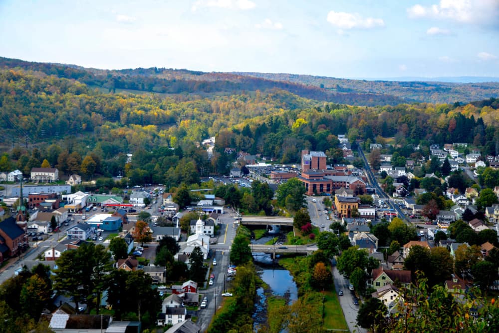 A panoramic view of Hawley, Pennsylvania, with colorful fall foliage and the Lackawaxen River.